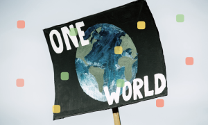 Plakat einer Demo mit der Aufschrift One World